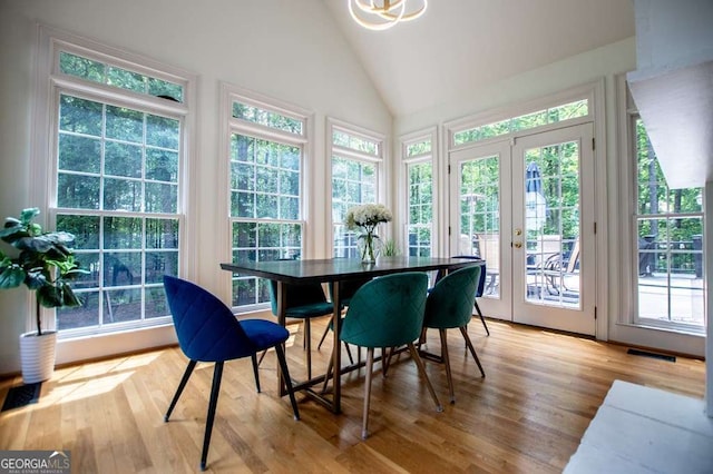 213 Shady Valley Dr, Carrollton, GA 30116 - sunroom featuring french doors, wood finished floors, and high vaulted ceiling