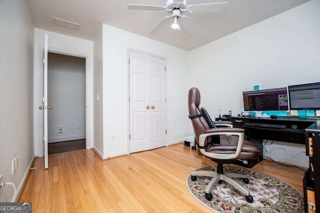 213 Shady Valley Dr, Carrollton, GA 30116 - home office with a ceiling fan and wood finished floors