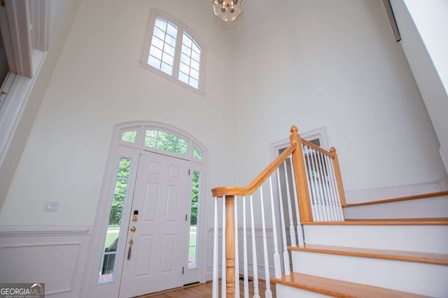 213 Shady Valley Dr, Carrollton, GA 30116 - entrance foyer featuring stairs, healthy amount of natural light, and a towering ceiling