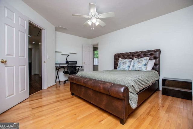 213 Shady Valley Dr, Carrollton, GA 30116 - bedroom featuring light wood finished floors, ceiling fan, and a desk