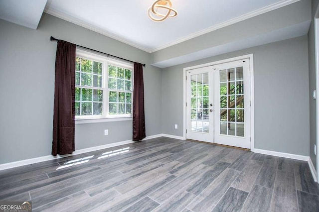 213 Shady Valley Dr, Carrollton, GA 30116 - empty room featuring french doors, ornamental molding, and wood finished floors