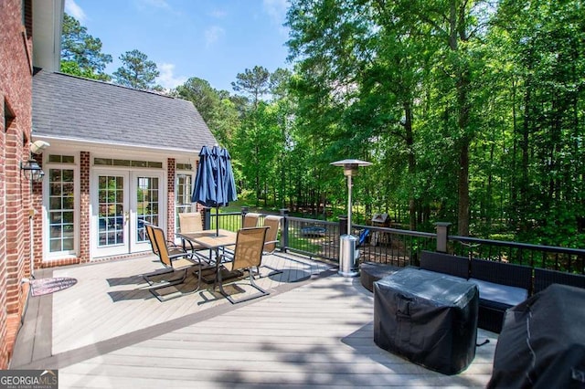 213 Shady Valley Dr, Carrollton, GA 30116 - wooden deck featuring outdoor dining area