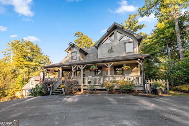 709 Laurel Creek Trl, Blue Ridge, GA 30513 - view of front of property with a porch and roof with shingles