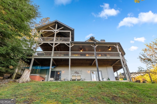 709 Laurel Creek Trl, Blue Ridge, GA 30513 - rear view of property featuring a chimney, a yard, and a deck