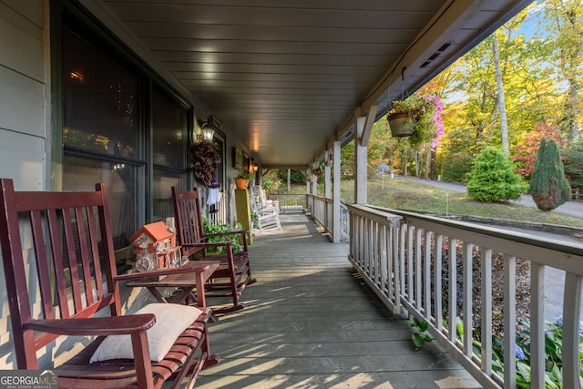 709 Laurel Creek Trl, Blue Ridge, GA 30513 - wooden deck with covered porch