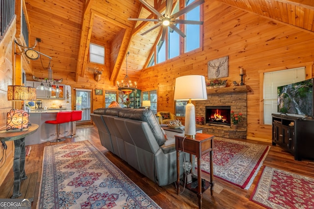 709 Laurel Creek Trl, Blue Ridge, GA 30513 - living room featuring wood-type flooring, wood walls, a healthy amount of sunlight, and high vaulted ceiling