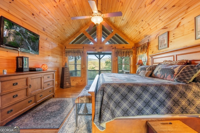 709 Laurel Creek Trl, Blue Ridge, GA 30513 - bedroom with wood walls, access to exterior, wooden ceiling, wood finished floors, and lofted ceiling