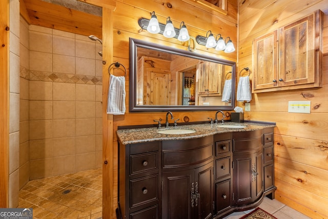 709 Laurel Creek Trl, Blue Ridge, GA 30513 - full bathroom featuring wood walls, tiled shower, and a sink