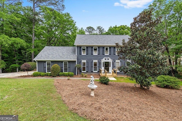 115 Old Ridge Rd, Macon, GA 31211 - colonial house with a front lawn and roof with shingles