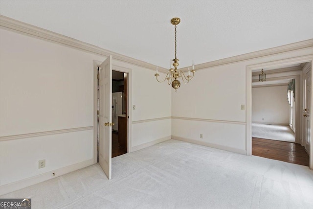 115 Old Ridge Rd, Macon, GA 31211 - unfurnished dining area with carpet floors, baseboards, and a notable chandelier