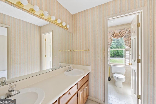115 Old Ridge Rd, Macon, GA 31211 - full bathroom with double vanity, a sink, toilet, and wallpapered walls