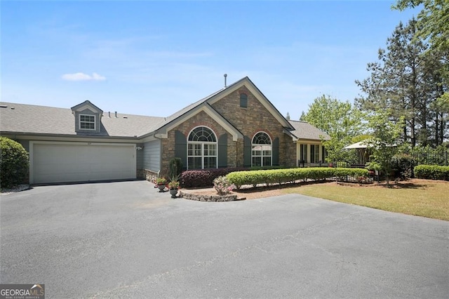 104 Highlands Ridge Pl Unit 1, Smyrna, GA 30082 - ranch-style home with an attached garage, a front yard, driveway, and stone siding