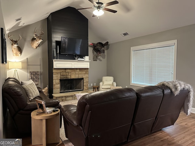 20 Wagon Trl, Mansfield, GA 30055 - living area featuring ceiling fan, visible vents, a fireplace, wood finished floors, and lofted ceiling