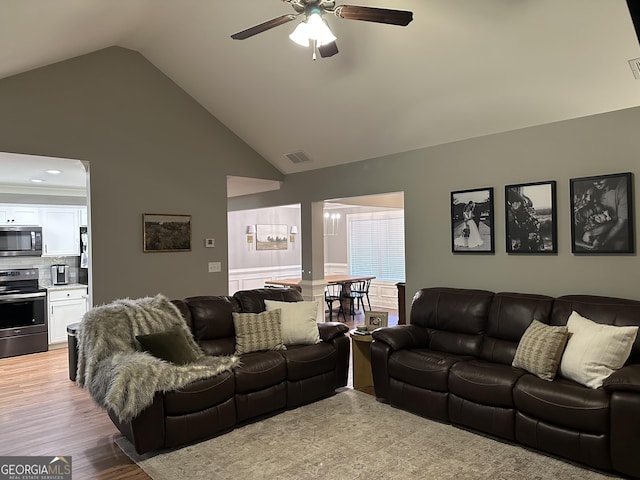 20 Wagon Trl, Mansfield, GA 30055 - living room featuring high vaulted ceiling, ceiling fan, wood finished floors, and visible vents