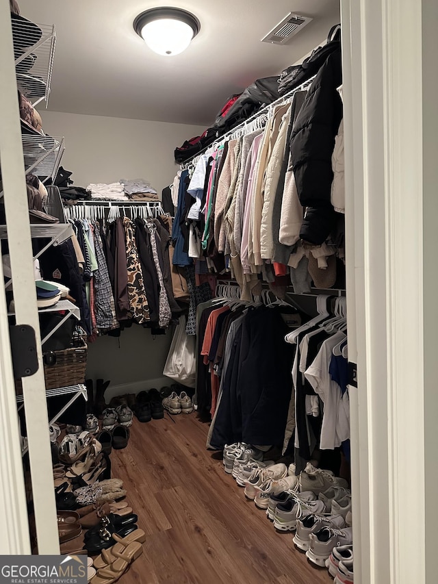 20 Wagon Trl, Mansfield, GA 30055 - spacious closet featuring visible vents and wood finished floors