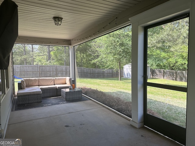 20 Wagon Trl, Mansfield, GA 30055 - view of patio / terrace featuring an outdoor structure, a fenced backyard, outdoor lounge area, and a storage shed