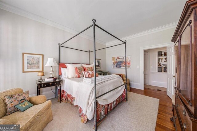 2727 Ingleside Ave, Macon, GA 31204 - bedroom featuring baseboards, ornamental molding, and wood finished floors