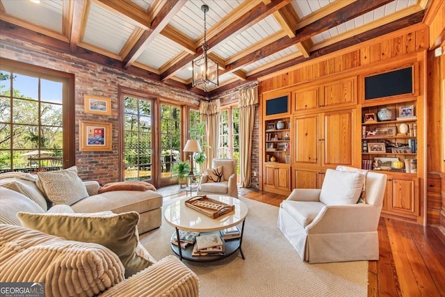 2727 Ingleside Ave, Macon, GA 31204 - sitting room featuring wood walls, beam ceiling, a chandelier, hardwood / wood-style flooring, and coffered ceiling
