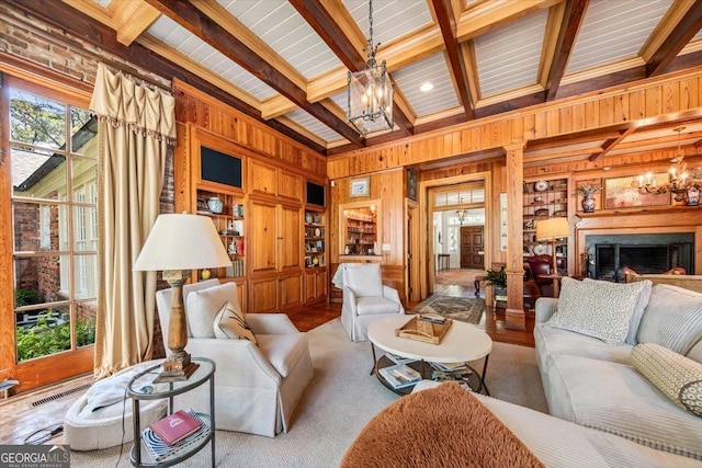 2727 Ingleside Ave, Macon, GA 31204 - living area featuring crown molding, wood walls, a notable chandelier, and beamed ceiling