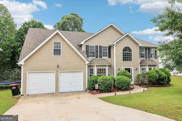 4015 Soaring Dr, Douglasville, GA 30135 - colonial inspired home with a garage, a trampoline, driveway, and a front yard