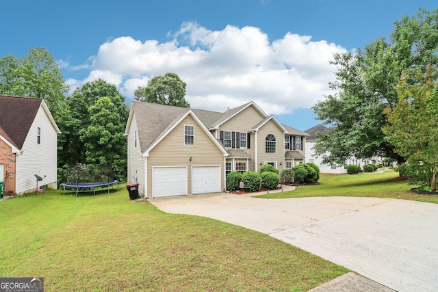 4015 Soaring Dr, Douglasville, GA 30135 - view of front of house with a garage, a trampoline, driveway, and a front lawn