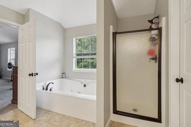 4015 Soaring Dr, Douglasville, GA 30135 - bathroom featuring a stall shower, tile patterned floors, baseboards, and a jetted tub