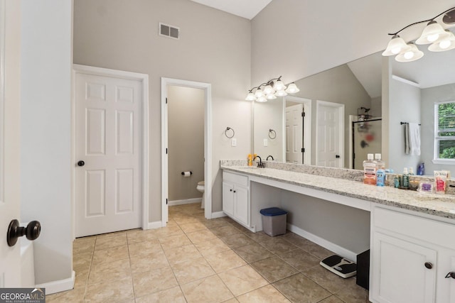 4015 Soaring Dr, Douglasville, GA 30135 - bathroom featuring visible vents, a shower stall, vanity, tile patterned floors, and toilet