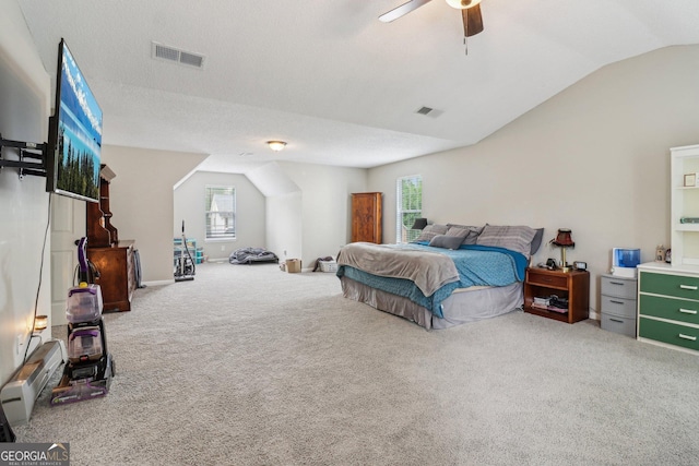 4015 Soaring Dr, Douglasville, GA 30135 - bedroom with visible vents, carpet, ceiling fan, and vaulted ceiling