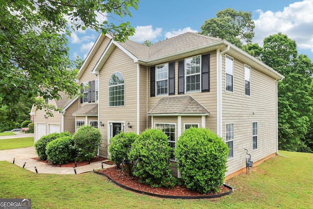 4015 Soaring Dr, Douglasville, GA 30135 - view of front of home with a garage and a front yard