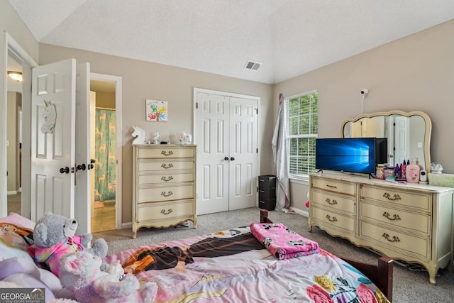 4015 Soaring Dr, Douglasville, GA 30135 - bedroom featuring visible vents, a closet, lofted ceiling, baseboards, and light colored carpet