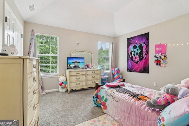 4015 Soaring Dr, Douglasville, GA 30135 - carpeted bedroom featuring baseboards, multiple windows, vaulted ceiling, and visible vents