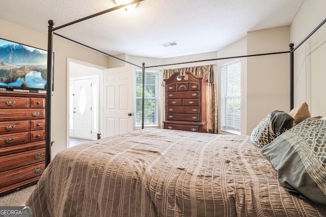 4015 Soaring Dr, Douglasville, GA 30135 - bedroom with a textured ceiling and visible vents