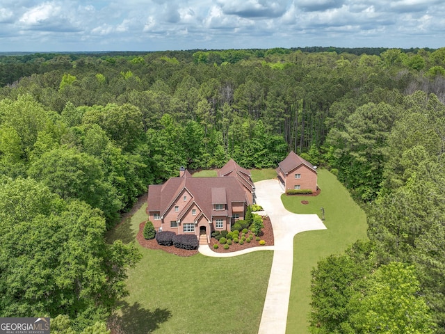 bird's eye view with a forest view