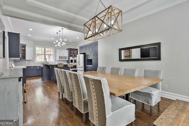 dining space featuring dark wood-style flooring, baseboards, a notable chandelier, ornamental molding, and recessed lighting