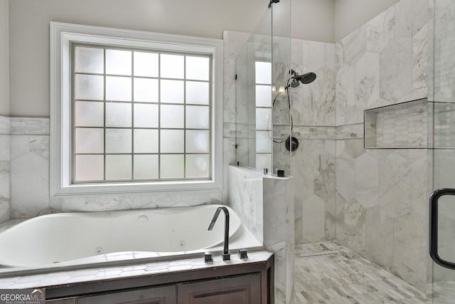 full bath with a tub with jets and a shower stall