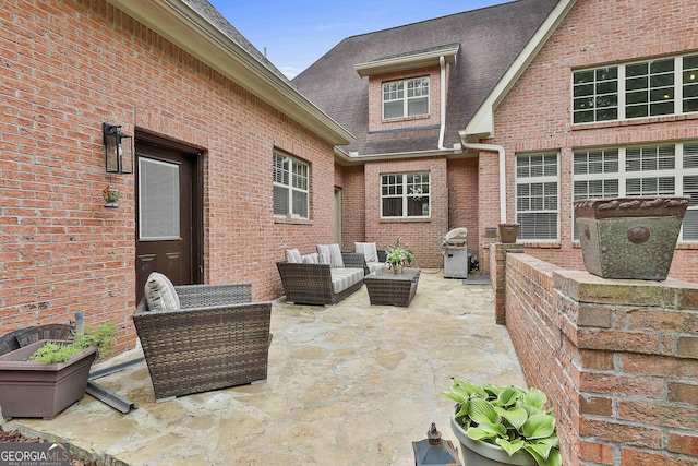 view of patio / terrace featuring area for grilling and outdoor lounge area
