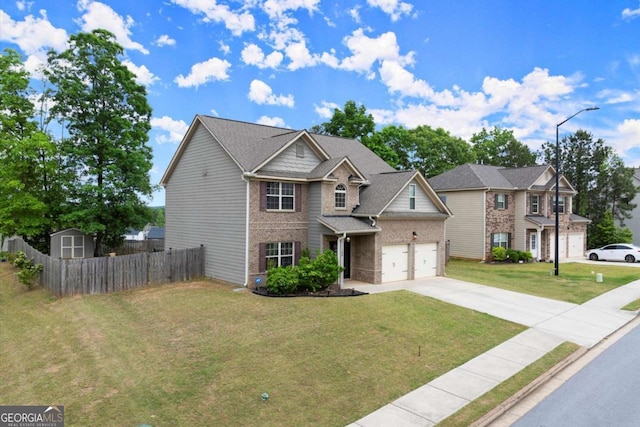 188 Lookout Way, Dallas, GA 30132 - traditional home with fence, concrete driveway, a front yard, and brick siding