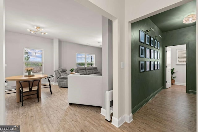 188 Lookout Way, Dallas, GA 30132 - corridor with baseboards, wood finished floors, and a baseboard radiator