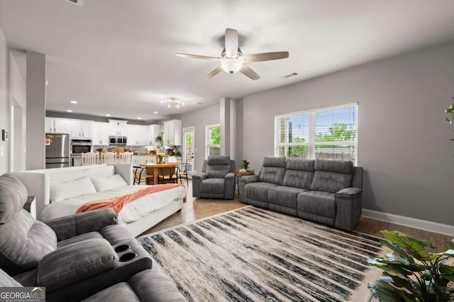 188 Lookout Way, Dallas, GA 30132 - living room featuring a ceiling fan, visible vents, wood finished floors, baseboards, and recessed lighting