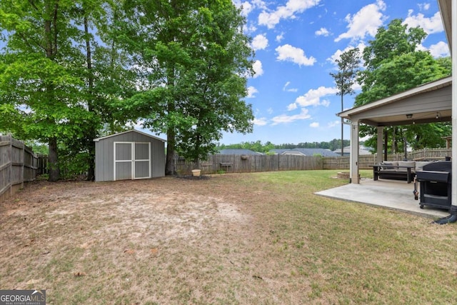 188 Lookout Way, Dallas, GA 30132 - view of yard featuring a storage shed, a patio, an outdoor structure, and a fenced backyard