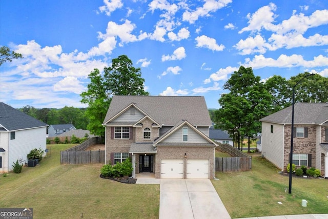 188 Lookout Way, Dallas, GA 30132 - craftsman house featuring brick siding, fence, driveway, and a front yard