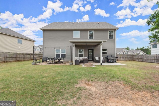 188 Lookout Way, Dallas, GA 30132 - back of property with a fenced backyard, a yard, an outdoor living space, and a patio area