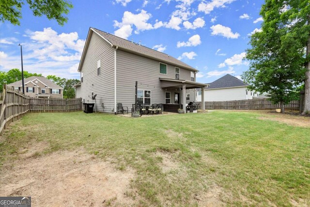 188 Lookout Way, Dallas, GA 30132 - back of house with a lawn, a patio, and a fenced backyard