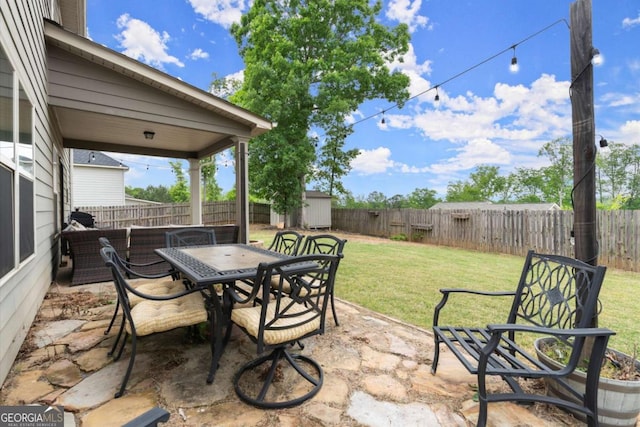 188 Lookout Way, Dallas, GA 30132 - view of patio with an outdoor structure, outdoor dining space, a fenced backyard, and a shed