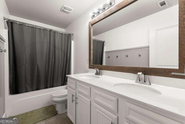 188 Lookout Way, Dallas, GA 30132 - bathroom featuring double vanity, toilet, visible vents, and a sink