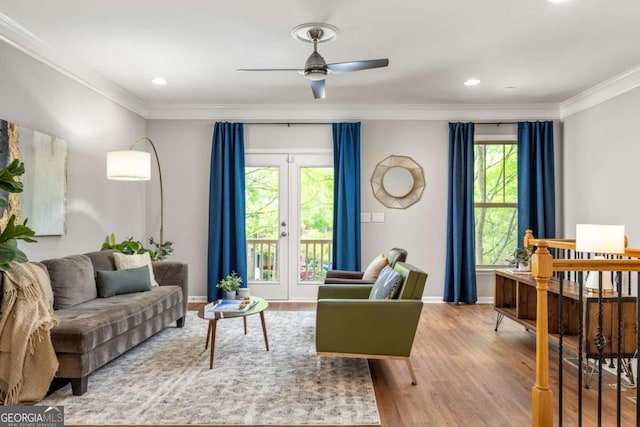 sitting room featuring recessed lighting, ceiling fan, ornamental molding, and wood finished floors