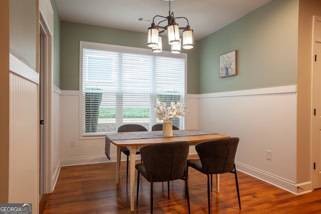 3508 Blue Spruce Ct SW, Gainesville, GA 30504 - dining area with a chandelier, wainscoting, and wood finished floors