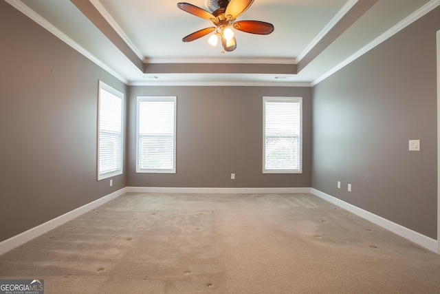 3508 Blue Spruce Ct SW, Gainesville, GA 30504 - empty room featuring a raised ceiling, light carpet, a ceiling fan, ornamental molding, and baseboards