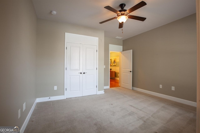 3508 Blue Spruce Ct SW, Gainesville, GA 30504 - unfurnished bedroom with a closet, baseboards, light carpet, and ceiling fan