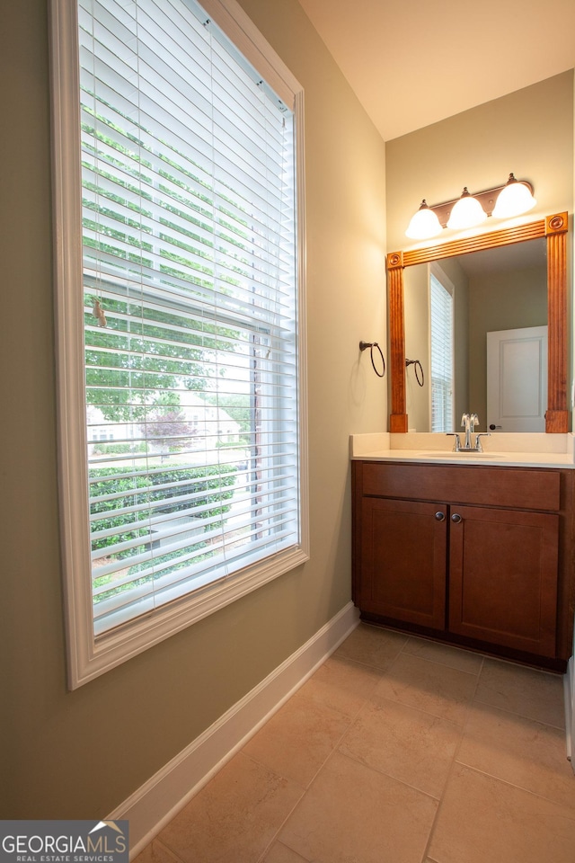 3508 Blue Spruce Ct SW, Gainesville, GA 30504 - bathroom featuring vanity, baseboards, and tile patterned floors